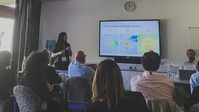 Presenting slides at the SECED2023 conference.